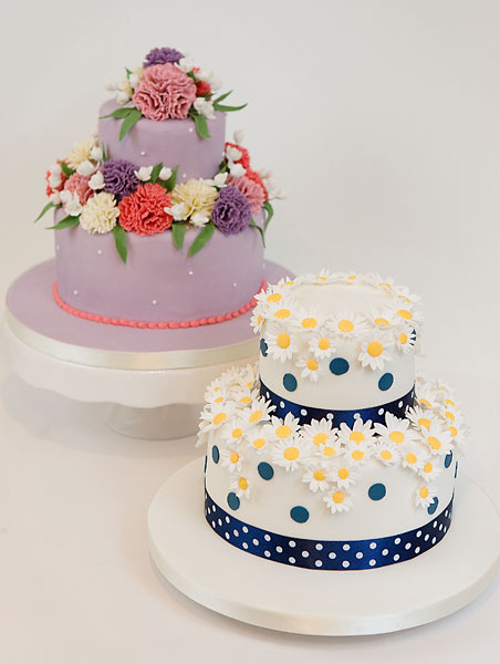 Two Tier Celebration Cakes, Lavender with Coronations, White & Blue with Daisies