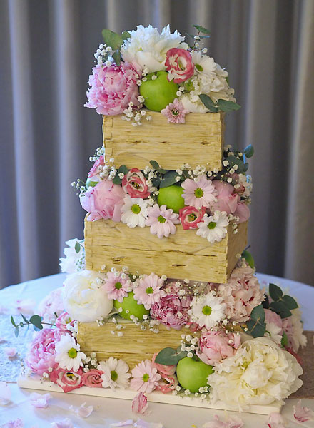 'Stack of Crates' Wedding Cake with an Abundance Fresh Flowers & Fruits.